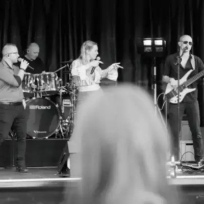 Lead singer performing during a live show